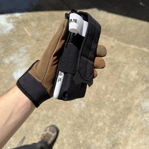 Black Kanga Systems STAT Tourniquet Pouch with MOLLE-compatible mounting for securely carrying a CAT-style tourniquet.