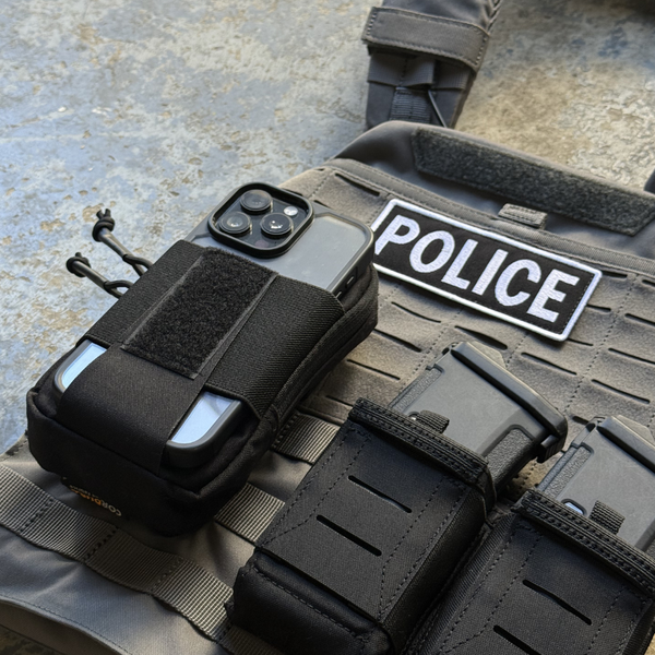 Kanga Systems Trace Phone Pouch with external smartphone retention system, Cordura® construction, rear storage compartment and MOLLE-compatible mounting.