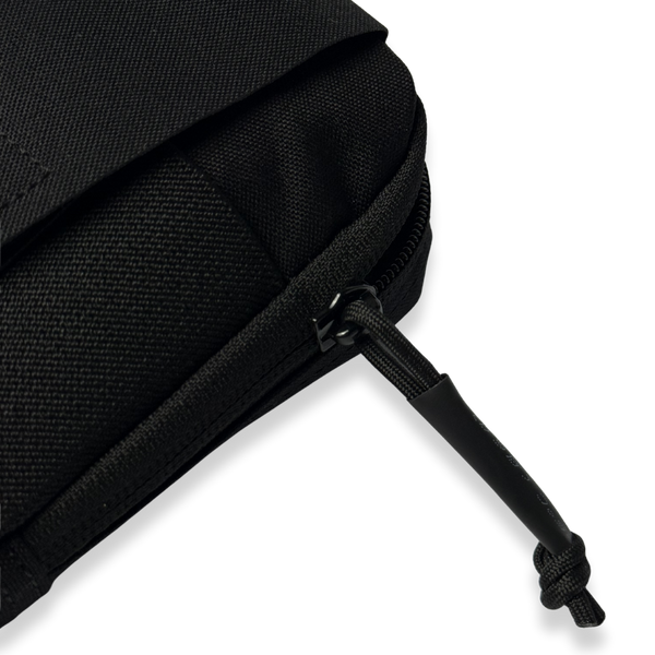 Kanga Systems Trace Phone Pouch with external smartphone retention system, Cordura® construction, rear storage compartment and MOLLE-compatible mounting.