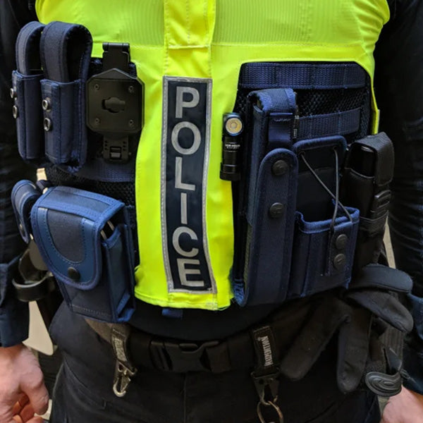 Olight Perun 3 Mini mounted to police load-bearing equipment for hands-free lighting
